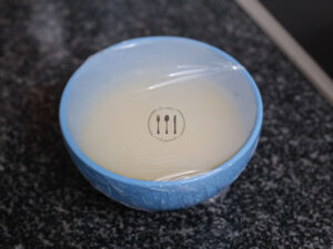 Lentejas con cuscús y verduras 13 Cuscus cubierto con film transparente